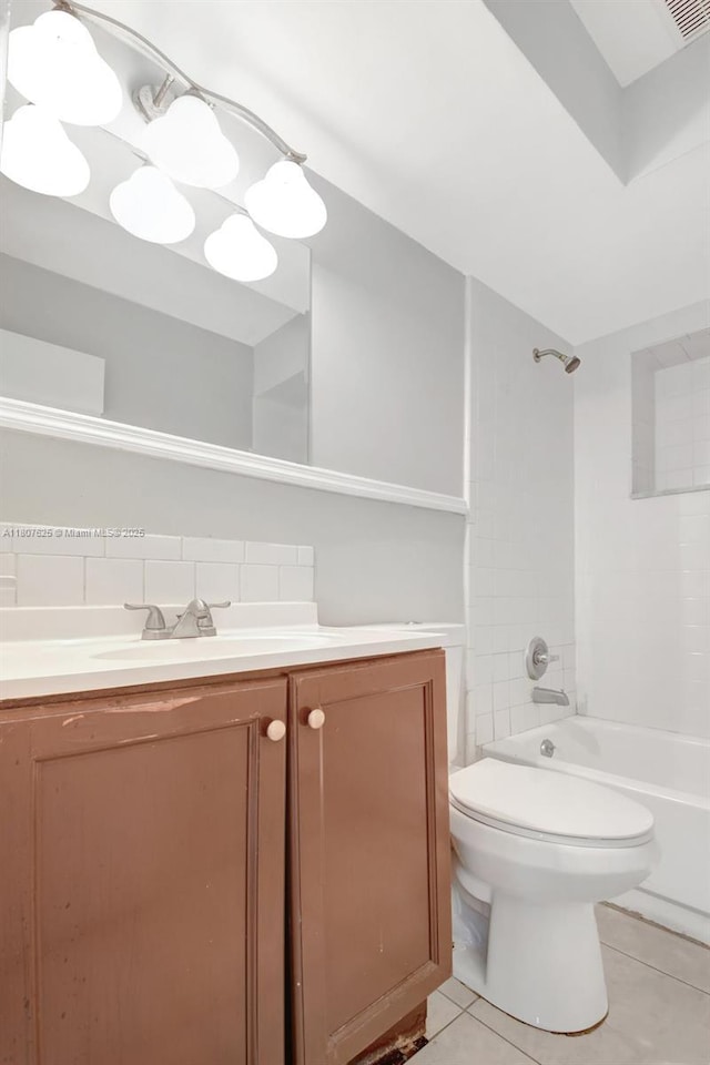 6160 Camp Lee Rd, West Palm Beach, FL 33417 - full bath with vanity, tile patterned flooring, toilet, bathtub / shower combination, and tasteful backsplash