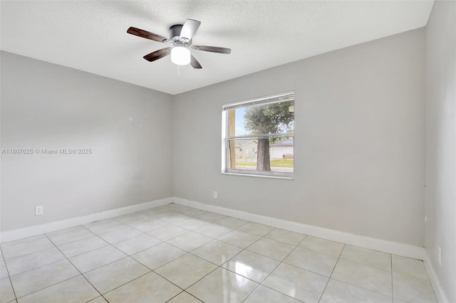 6160 Camp Lee Rd, West Palm Beach, FL 33417 - spare room with ceiling fan, baseboards, a textured ceiling, and light tile patterned floors