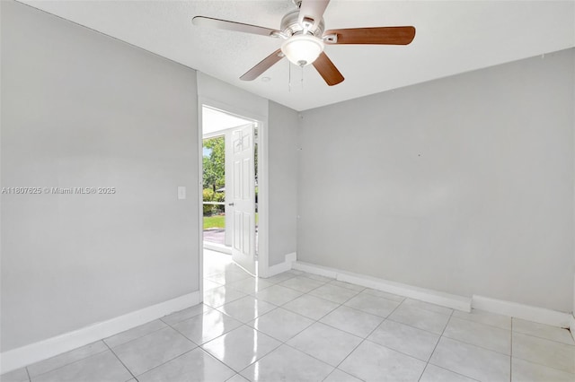 6160 Camp Lee Rd, West Palm Beach, FL 33417 - unfurnished room with baseboards, a ceiling fan, and light tile patterned floors