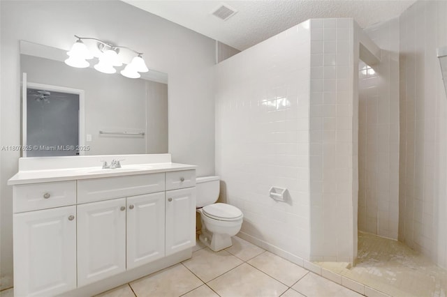 6160 Camp Lee Rd, West Palm Beach, FL 33417 - bathroom featuring walk in shower, toilet, tile patterned floors, vanity, and ceiling fan