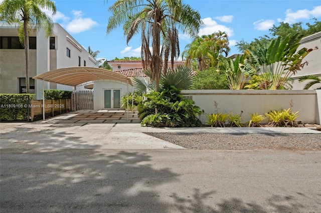 1771 Wa Kee Na Dr, Miami, FL 33133 - view of front of house with stucco siding and french doors