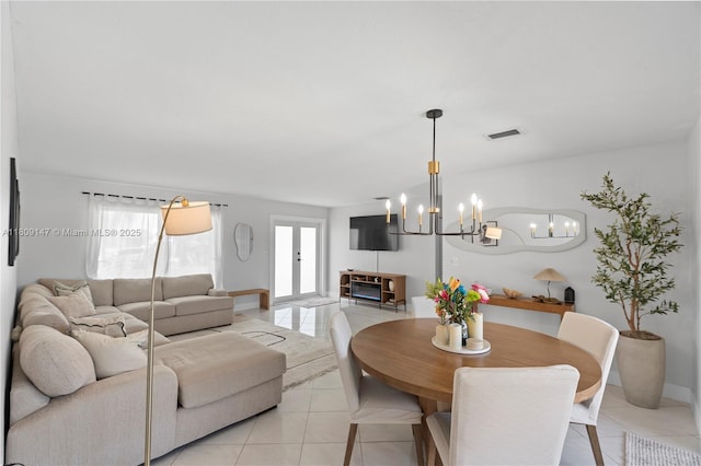 8930 SW 50th Ter, Miami, FL 33165 - dining room featuring a chandelier and light tile patterned floors