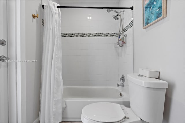 8930 SW 50th Ter, Miami, FL 33165 - bathroom featuring toilet and shower / bath combo with shower curtain