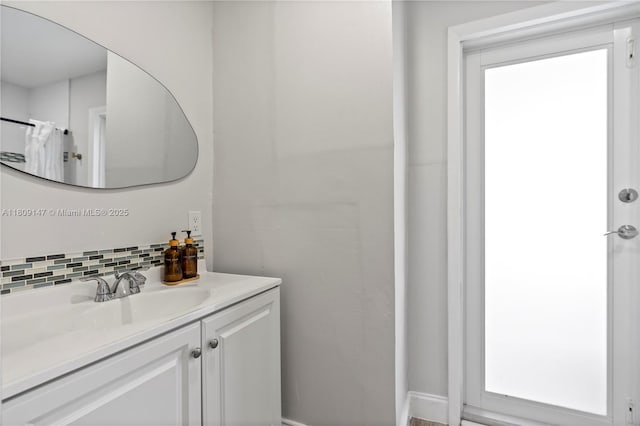 8930 SW 50th Ter, Miami, FL 33165 - bathroom featuring vanity and backsplash