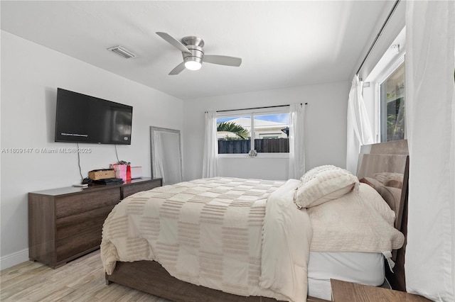8930 SW 50th Ter, Miami, FL 33165 - bedroom featuring light wood-style flooring, a ceiling fan, and baseboards