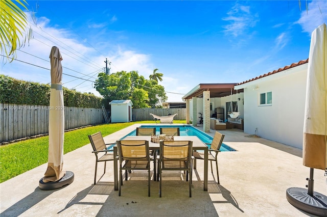 8930 SW 50th Ter, Miami, FL 33165 - fenced backyard with outdoor dining area, outdoor lounge area, and a patio area