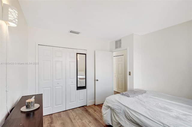 5972 SW 163rd Pl, Miami, FL 33193 - bedroom featuring light wood-style floors and a closet