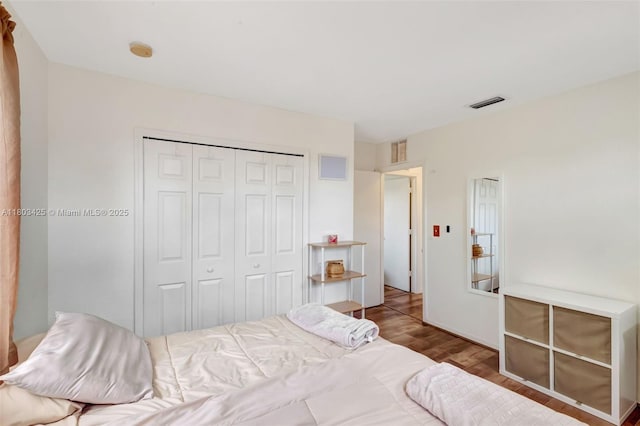 5972 SW 163rd Pl, Miami, FL 33193 - bedroom featuring wood finished floors and a closet