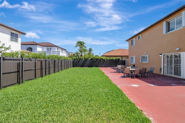 5972 SW 163rd Pl, Miami, FL 33193 - view of yard featuring a patio