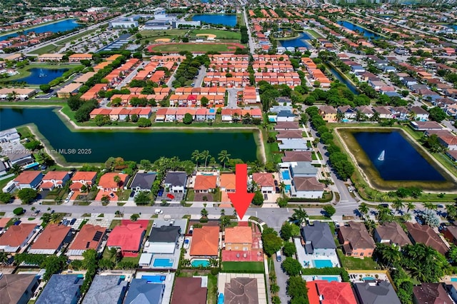 5972 SW 163rd Pl, Miami, FL 33193 - aerial view of property and surrounding area with nearby suburban area and a large body of water