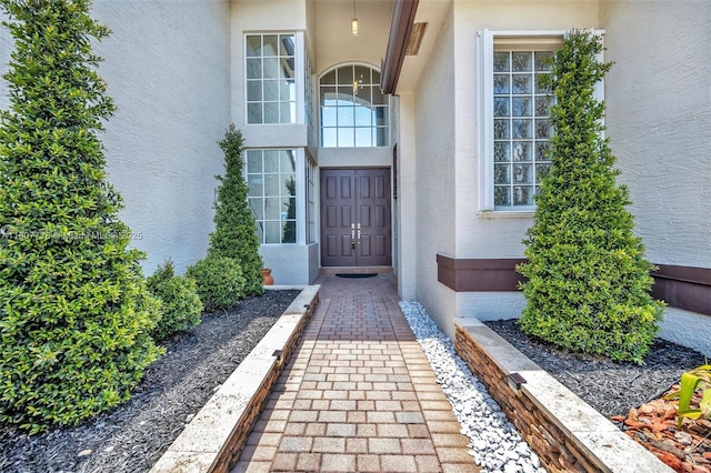 5466 SW 187th Ter, Miramar, FL 33029 - doorway to property with stucco siding