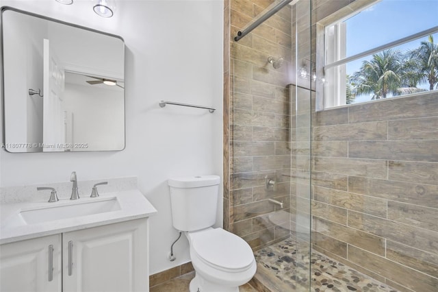5466 SW 187th Ter, Miramar, FL 33029 - full bathroom with toilet, a stall shower, vanity, and tile patterned flooring