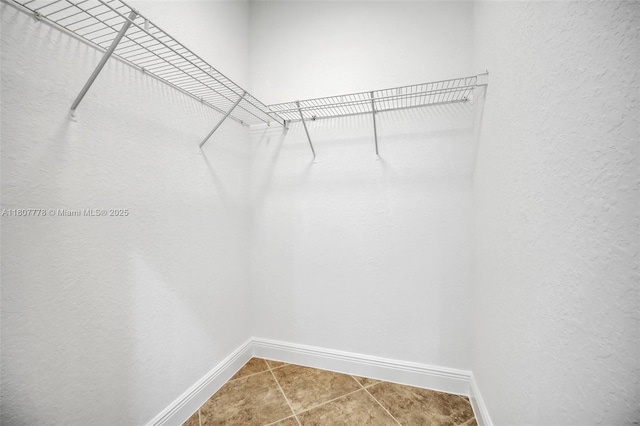 5466 SW 187th Ter, Miramar, FL 33029 - spacious closet featuring tile patterned floors
