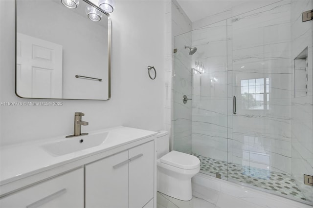 5466 SW 187th Ter, Miramar, FL 33029 - full bathroom featuring a marble finish shower, vanity, and toilet