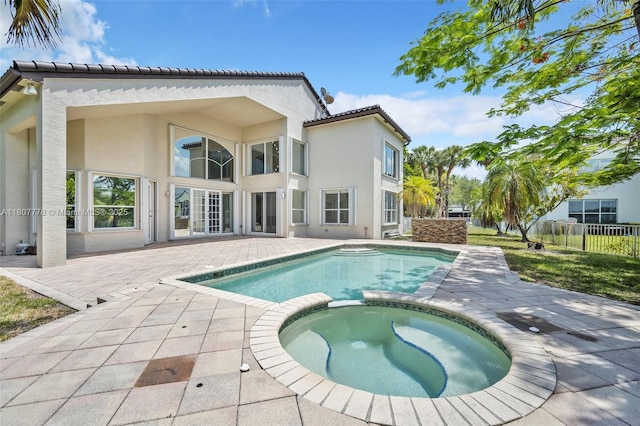 5466 SW 187th Ter, Miramar, FL 33029 - view of pool with a patio and a pool with connected hot tub