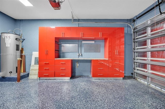 5466 SW 187th Ter, Miramar, FL 33029 - garage with water heater, a textured wall, and a garage door opener