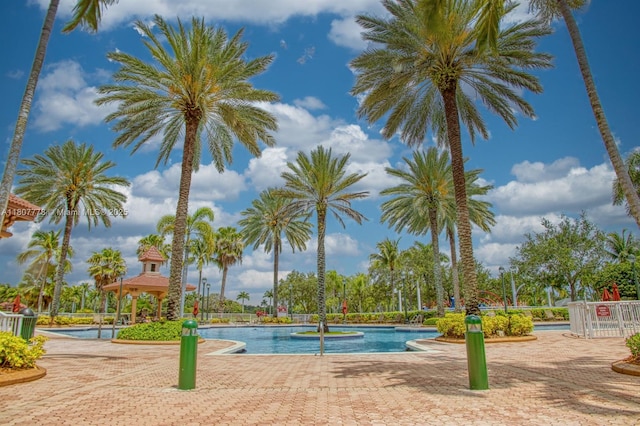 5466 SW 187th Ter, Miramar, FL 33029 - community pool featuring a patio area
