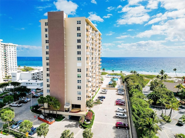 2000 S Ocean Blvd Unit 3B, Lauderdale By The Sea, FL 33062 - view of apartment building / complex with uncovered parking and a water view