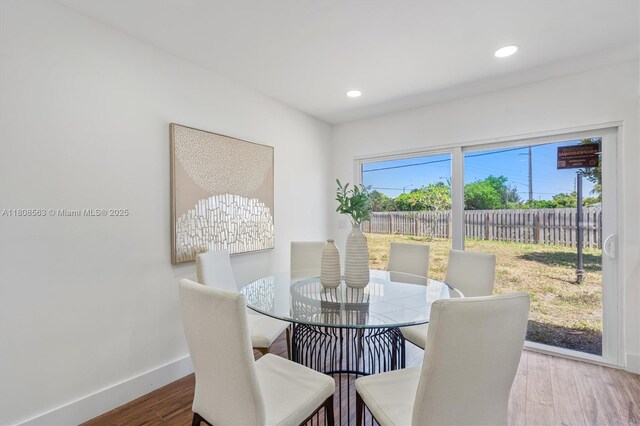 5492 Barnstead Cir, Lake Worth, FL 33463 - dining space featuring wood finished floors, baseboards, and recessed lighting