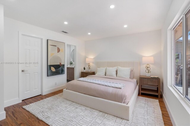 5492 Barnstead Cir, Lake Worth, FL 33463 - bedroom with wood finished floors, recessed lighting, and baseboards
