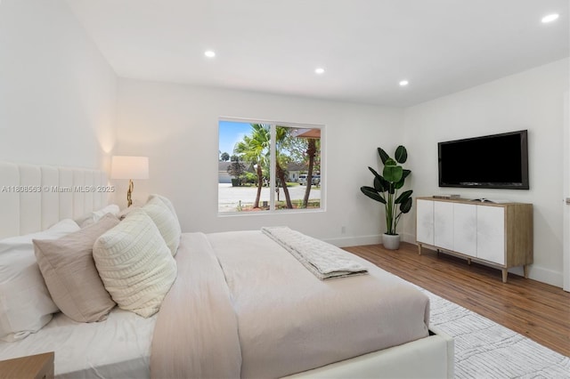 5492 Barnstead Cir, Lake Worth, FL 33463 - bedroom featuring recessed lighting, wood finished floors, and baseboards