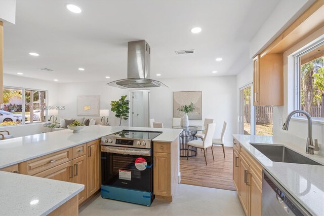 5492 Barnstead Cir, Lake Worth, FL 33463 - kitchen with stainless steel appliances, a sink, island exhaust hood, healthy amount of natural light, and recessed lighting