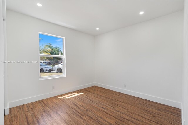 5492 Barnstead Cir, Lake Worth, FL 33463 - empty room featuring wood finished floors, baseboards, and recessed lighting