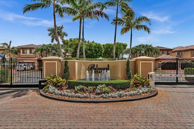 4362 NW 112th Ct, Doral, FL 33178 - community / neighborhood sign featuring a gate and a residential view