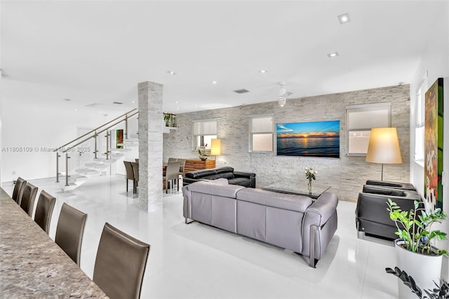 4362 NW 112th Ct, Doral, FL 33178 - living area with decorative columns, light tile patterned floors, stairway, and recessed lighting