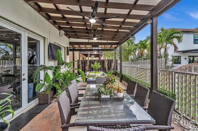 4362 NW 112th Ct, Doral, FL 33178 - fenced backyard featuring outdoor dining space, french doors, ceiling fan, a patio, and an outdoor hangout area
