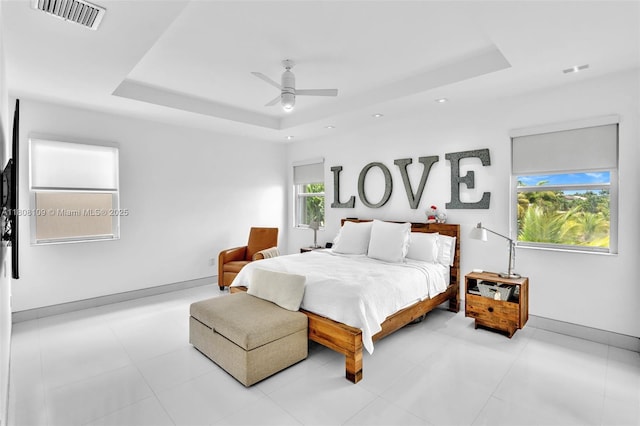 4362 NW 112th Ct, Doral, FL 33178 - bedroom with a raised ceiling, multiple windows, baseboards, a ceiling fan, and recessed lighting