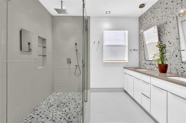 4362 NW 112th Ct, Doral, FL 33178 - bathroom with tiled shower, double vanity, tile patterned flooring, baseboards, and electric panel
