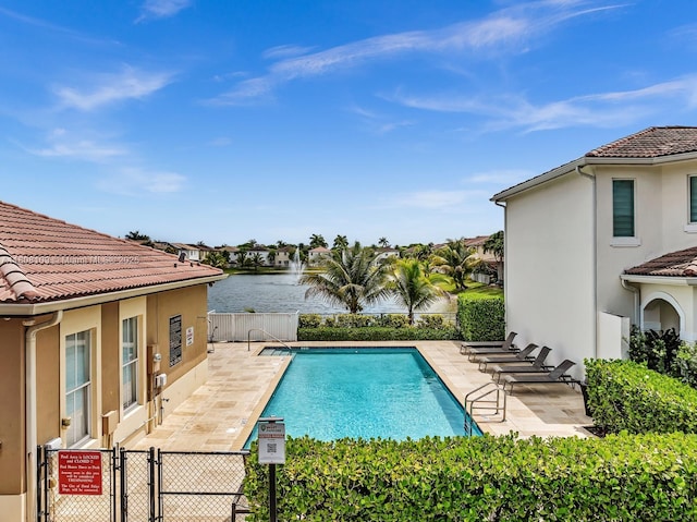 4362 NW 112th Ct, Doral, FL 33178 - community pool with a patio area, a water view, and a gate