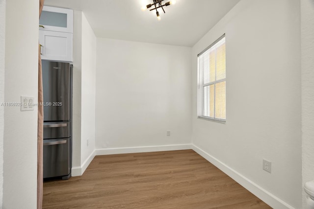 2928 SE 2nd St Unit 5, Homestead, FL 33033 - unfurnished room featuring light wood finished floors and baseboards