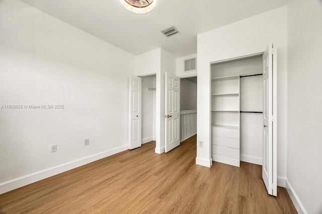 2928 SE 2nd St Unit 5, Homestead, FL 33033 - unfurnished bedroom featuring light wood finished floors and baseboards
