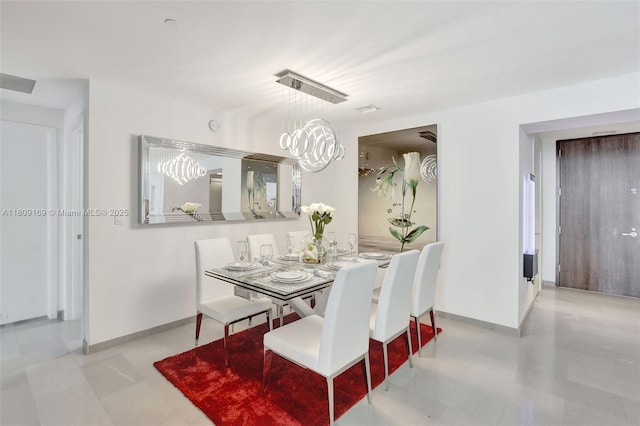 68 SE 6th St Unit 1203, Miami, FL 33131 - dining area with baseboards