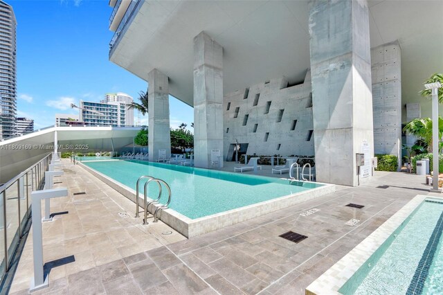 68 SE 6th St Unit 1203, Miami, FL 33131 - community pool with a city view