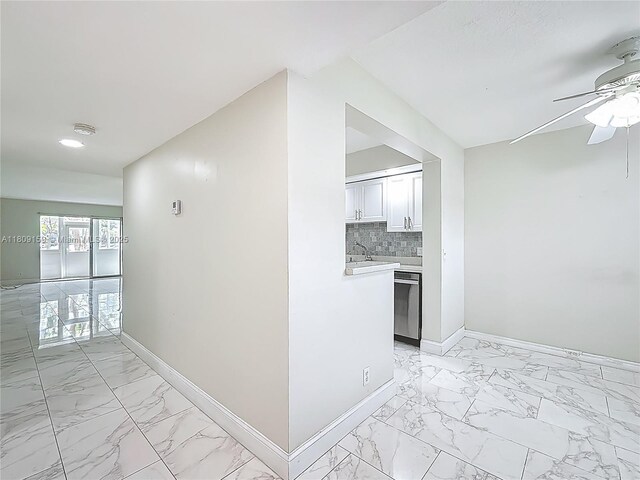 1100 SW 130th Ave Unit 111H, Pembroke Pines, FL 33027 - hallway with light marble finish floors, baseboards, and recessed lighting