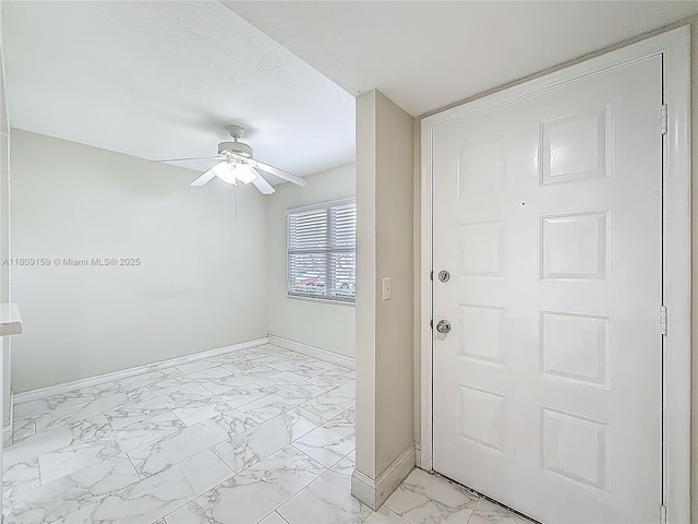 1100 SW 130th Ave Unit 111H, Pembroke Pines, FL 33027 - foyer entrance featuring light marble finish floors, baseboards, and ceiling fan