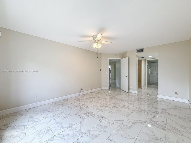 1100 SW 130th Ave Unit 111H, Pembroke Pines, FL 33027 - unfurnished bedroom featuring baseboards, light marble finish flooring, and a ceiling fan