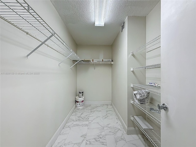 1100 SW 130th Ave Unit 111H, Pembroke Pines, FL 33027 - walk in closet with marble finish floors