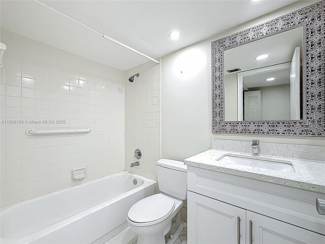 1100 SW 130th Ave Unit 111H, Pembroke Pines, FL 33027 - full bathroom featuring toilet, vanity, bathing tub / shower combination, and recessed lighting