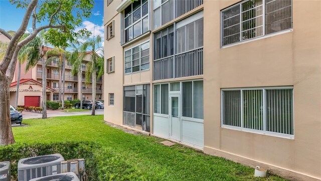 1100 SW 130th Ave Unit 111H, Pembroke Pines, FL 33027 - view of apartment building / complex with central AC