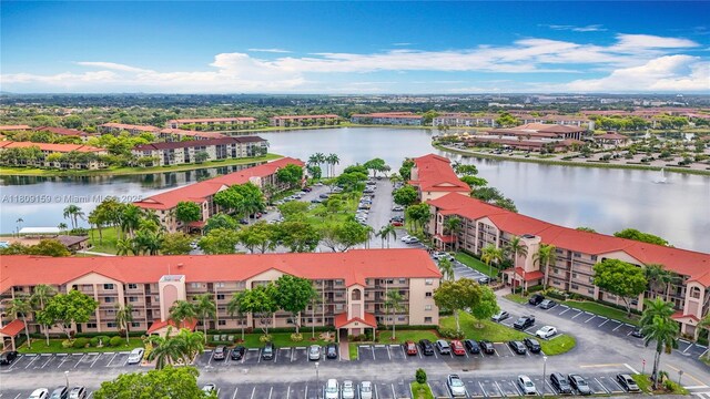 1100 SW 130th Ave Unit 111H, Pembroke Pines, FL 33027 - drone / aerial view of a large body of water and apartment complex
