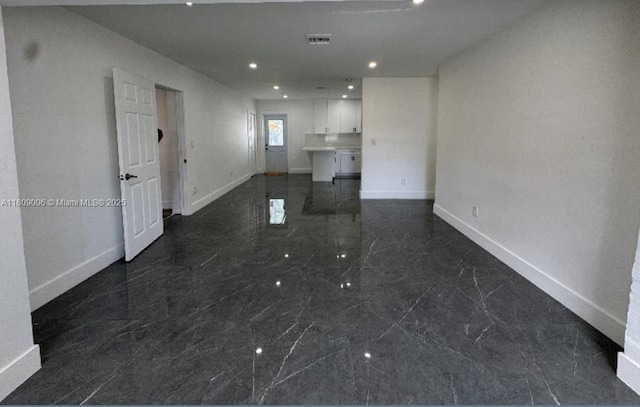 12455 SW 187th Ter, Miami, FL 33177 - empty room featuring dark marble finish floors, baseboards, and recessed lighting