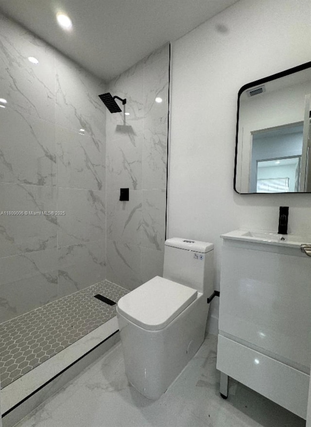 12455 SW 187th Ter, Miami, FL 33177 - bathroom with marble finish floors, vanity, toilet, and a marble finish shower