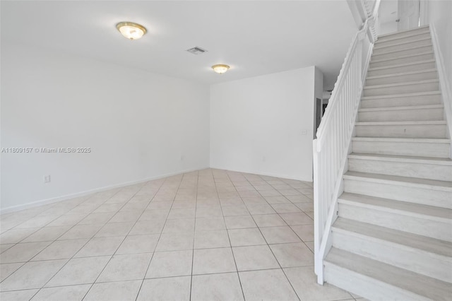 8206 SW 29th St Unit 104, Miramar, FL 33025 - empty room with stairway and light tile patterned floors