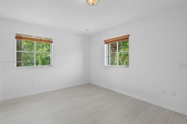 8206 SW 29th St Unit 104, Miramar, FL 33025 - unfurnished room with light wood-style floors and baseboards
