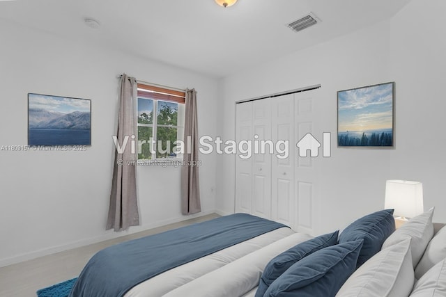 8206 SW 29th St Unit 104, Miramar, FL 33025 - bedroom featuring baseboards and a closet