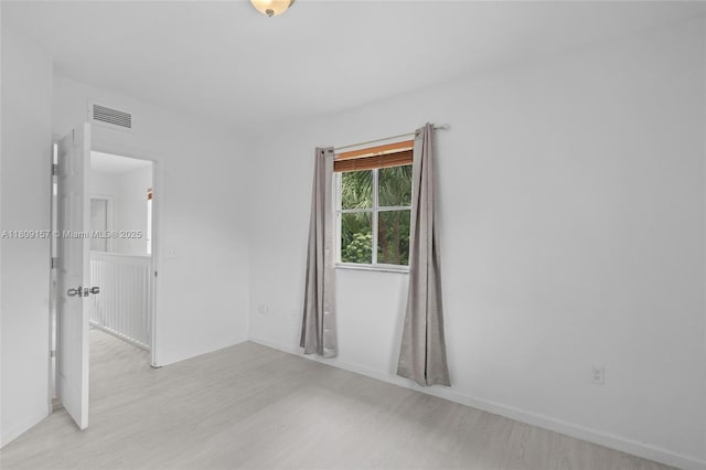 8206 SW 29th St Unit 104, Miramar, FL 33025 - empty room with light wood-style floors and baseboards